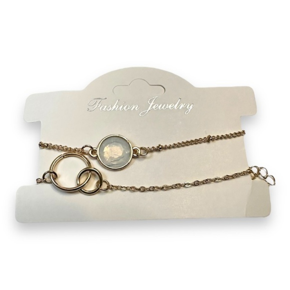 4/$25 -
Pair of Gold Tone Bracelets
